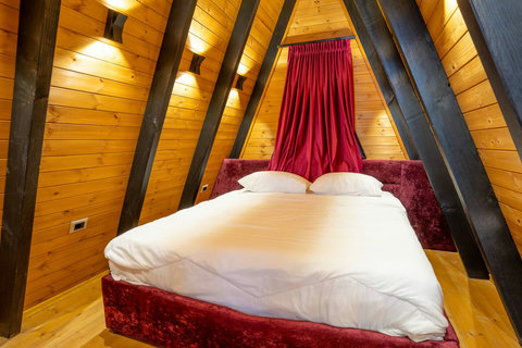 Bedroom with a double and two single beds