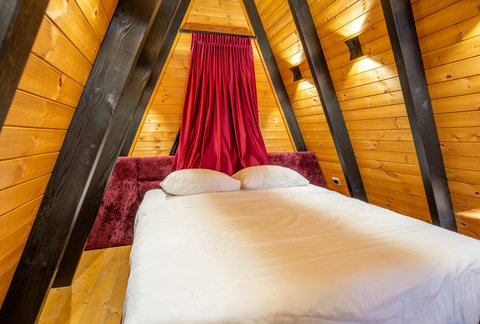 Bedroom with a double and two single beds