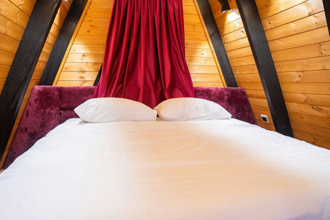 Bedroom with a double and two single beds