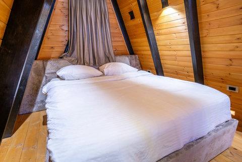 Bedroom with a double and two single beds