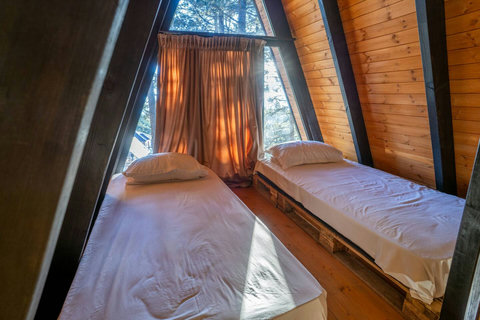 Bedroom with a double and two single beds