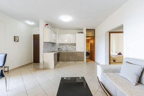 Living room and fully-equipped kitchen