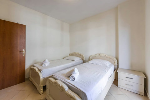 Bedroom 2 with two single beds