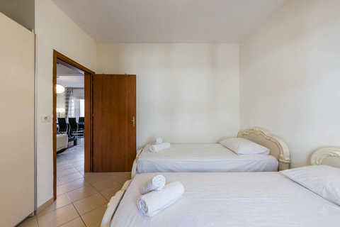 Bedroom 2 with two single beds