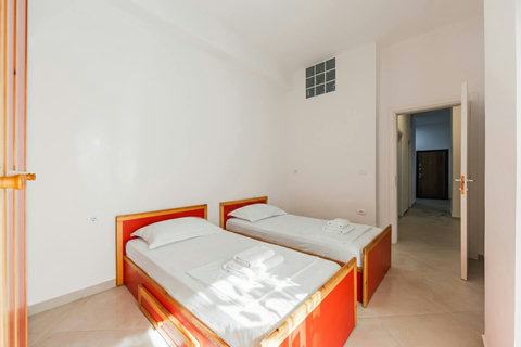 Bedroom 2 with two single beds