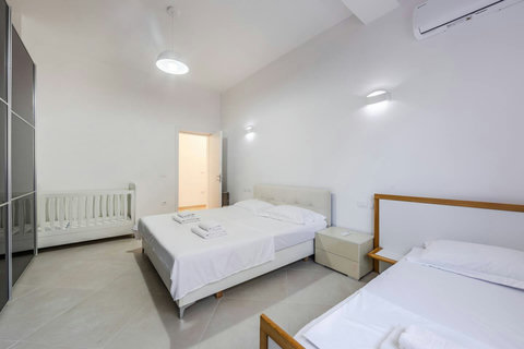 Bedroom 1 with a double and a single bed