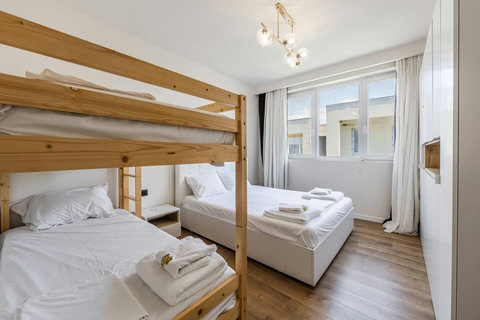 Bedroom with a double and a bunk bed