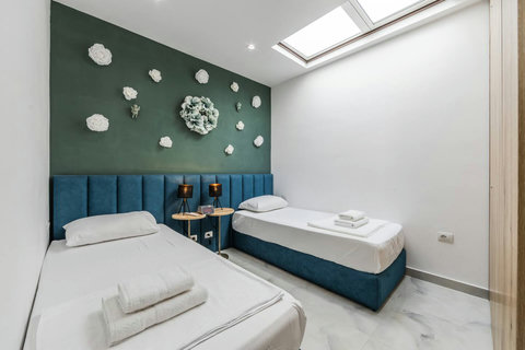 Bedroom 2 with two single beds