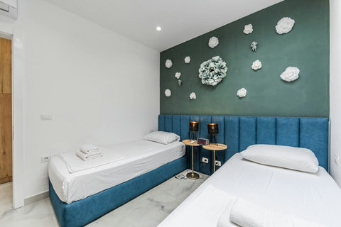 Bedroom 2 with two single beds