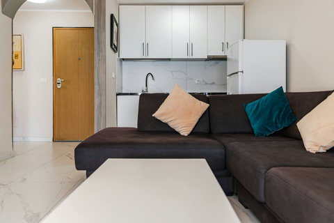 Living room and fully-equipped kitchen