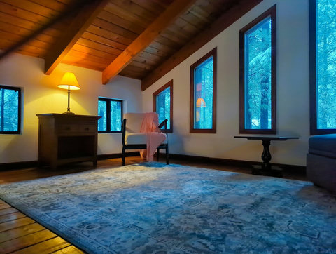 Loft Area has chair bed and space for air mattress as well as desk for remote work.