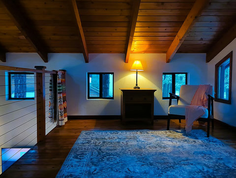 Loft Area has room for additional sleeping as well as desk for computer work.