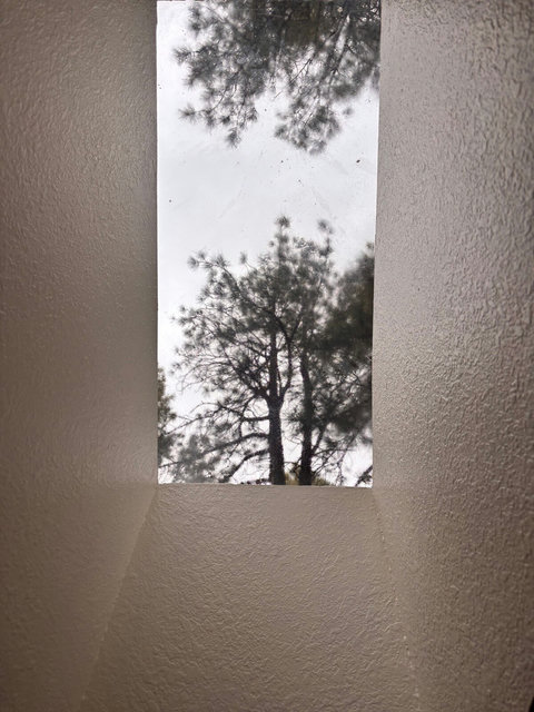 Skylight as seen from the primary bedroom bed.