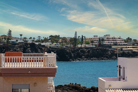 a view to the ocean from the bedroom's balcony