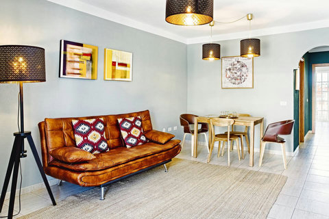 cozy and stylish living room with a dining table