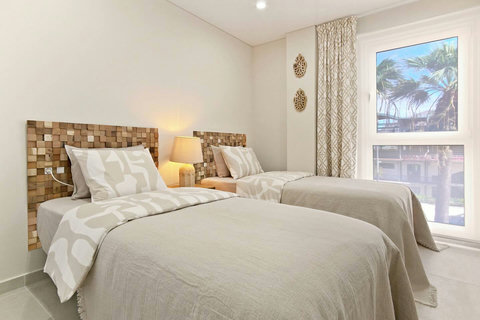 One bedroom with 2 single beds. Perfect for a family with kids or for singles