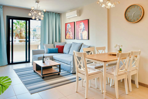 Sun-filled living area with open layout and elegant, modern design.