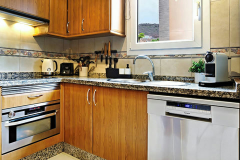 Your sleek Altos del Roque kitchen for gourmet feasts