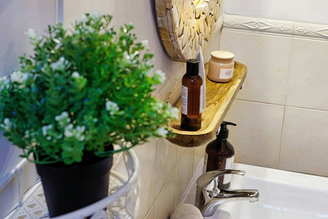 Your spa-like Altos del Roque bathroom with skylight glow