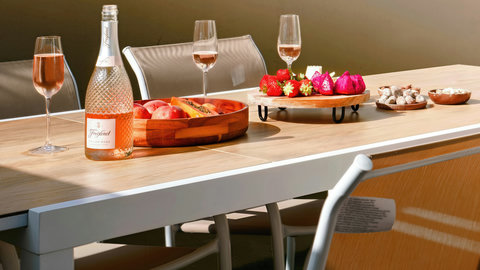 Sunlit patio dining set, perfect for al fresco bites and bubbly