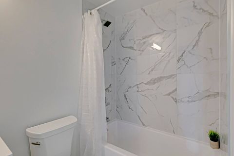 Modern bathroom with a spacious shower and fresh towels provided for your comfort