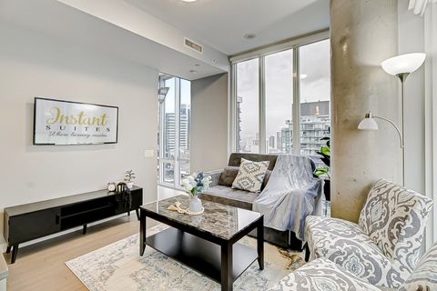 Natural light, modern decor, and cozy seating—your ideal lounging space.