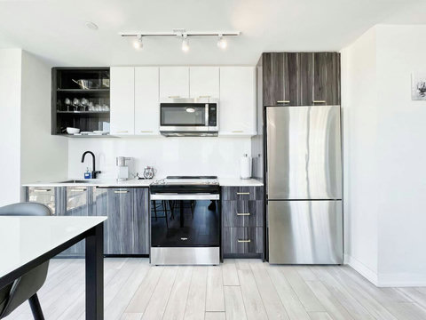 Elegant kitchen with premium countertops and fully basic stocked essentials