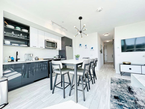 A welcoming living room that opens up to the outdoors.