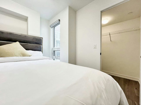 Bright and comfortable bedroom designed for a restful sta