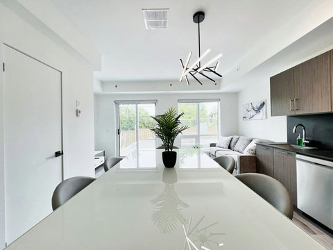 Simple and modern dining area ideal for family or group meals.