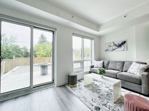 Cozy lounge spot with a beautiful view of the outdoors.