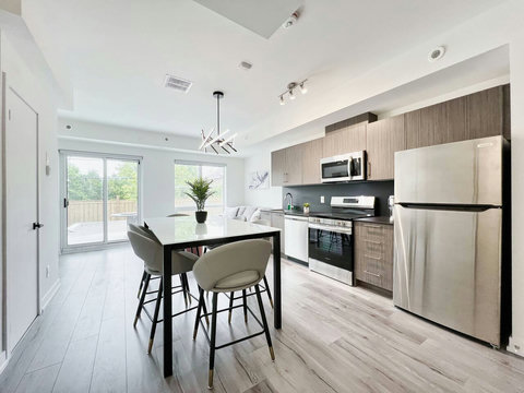 Spacious dining setup with plenty of natural light.