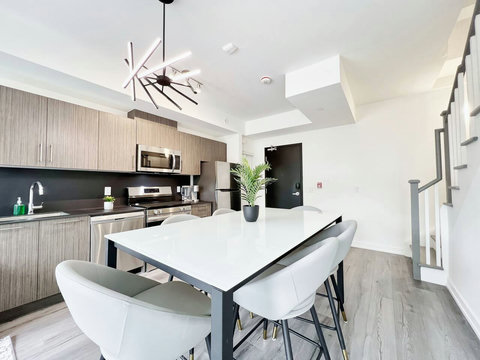 Fully equipped kitchen and bright dining area — perfect for cooking and gathering.