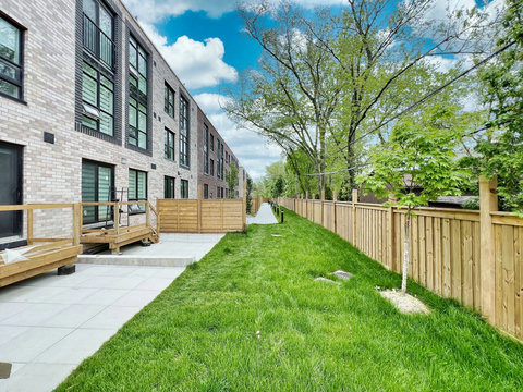 Well-maintained compound with clean pathways and open outdoor space