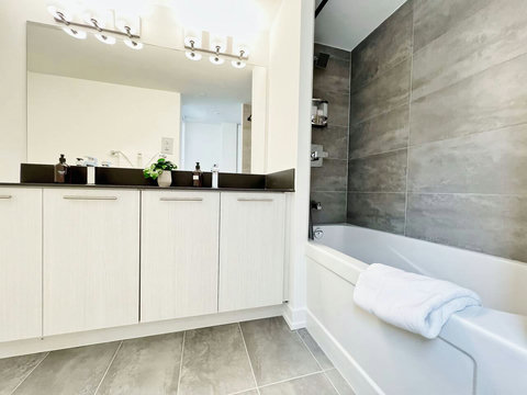 Bright, well-maintained bathroom with essential amenities.