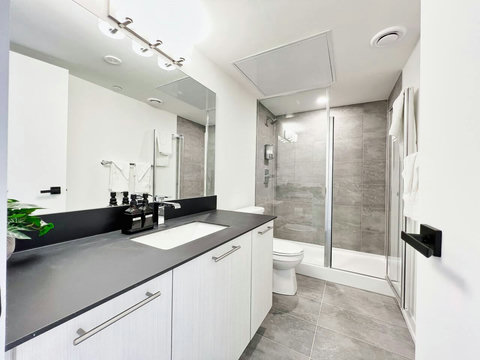 Neat bathroom setup with organized essentials for guest convenience.