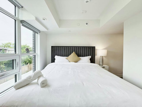 Spacious bedroom with plenty of natural light.