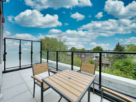 Step outside to this open patio and take in the breathtaking views from above. Enjoy the fresh air and peaceful surroundings in your own private outdoor oasis.