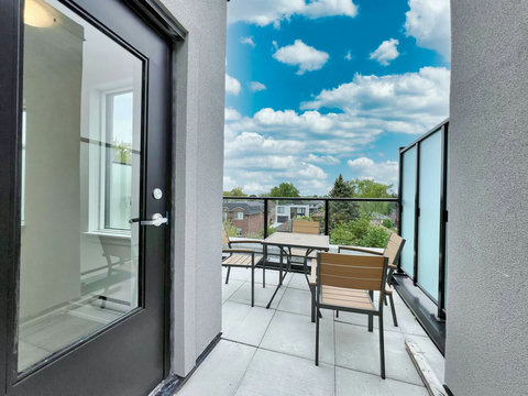 Relax on the rooftop patio while enjoying wide, open scenery