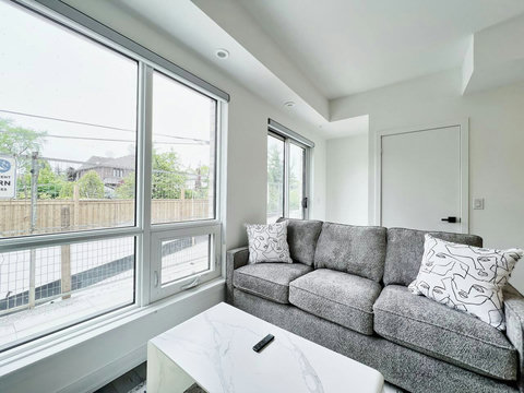 Cozy lounge spot with a beautiful view of the outdoors.