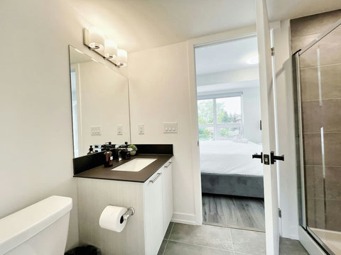 Neat bathroom setup with organized essentials for guest convenience.