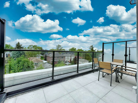 Spacious rooftop patio offering excellent views and plenty of fresh air.