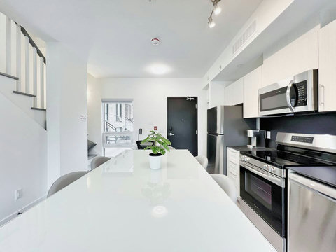 Prepare meals with ease in this well-stocked kitchen