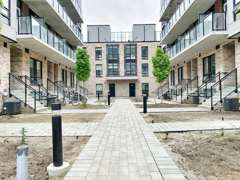 Inviting rooftop house view with spacious outdoor appeal