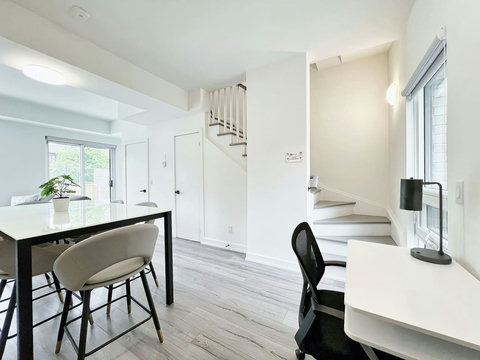 Bright workspace with a comfortable desk setup and calming outdoor view.