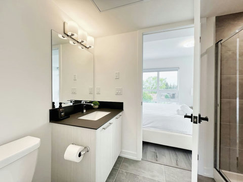 Bright, well-maintained bathroom with essential amenities.