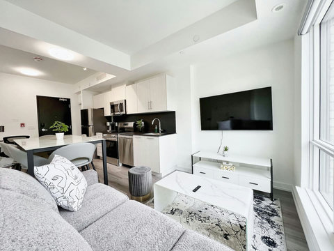 Cozy living room with a wall-mounted TV for easy entertainment