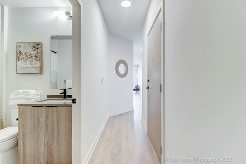 “Clean, bright bathroom designed for a refreshing stay.”