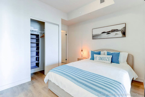 “Elegant bedroom with soft linens and a boutique-hotel feel”