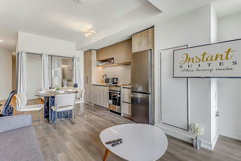 Cozy living room with comfortable seating and a smart TV for relaxing downtime.